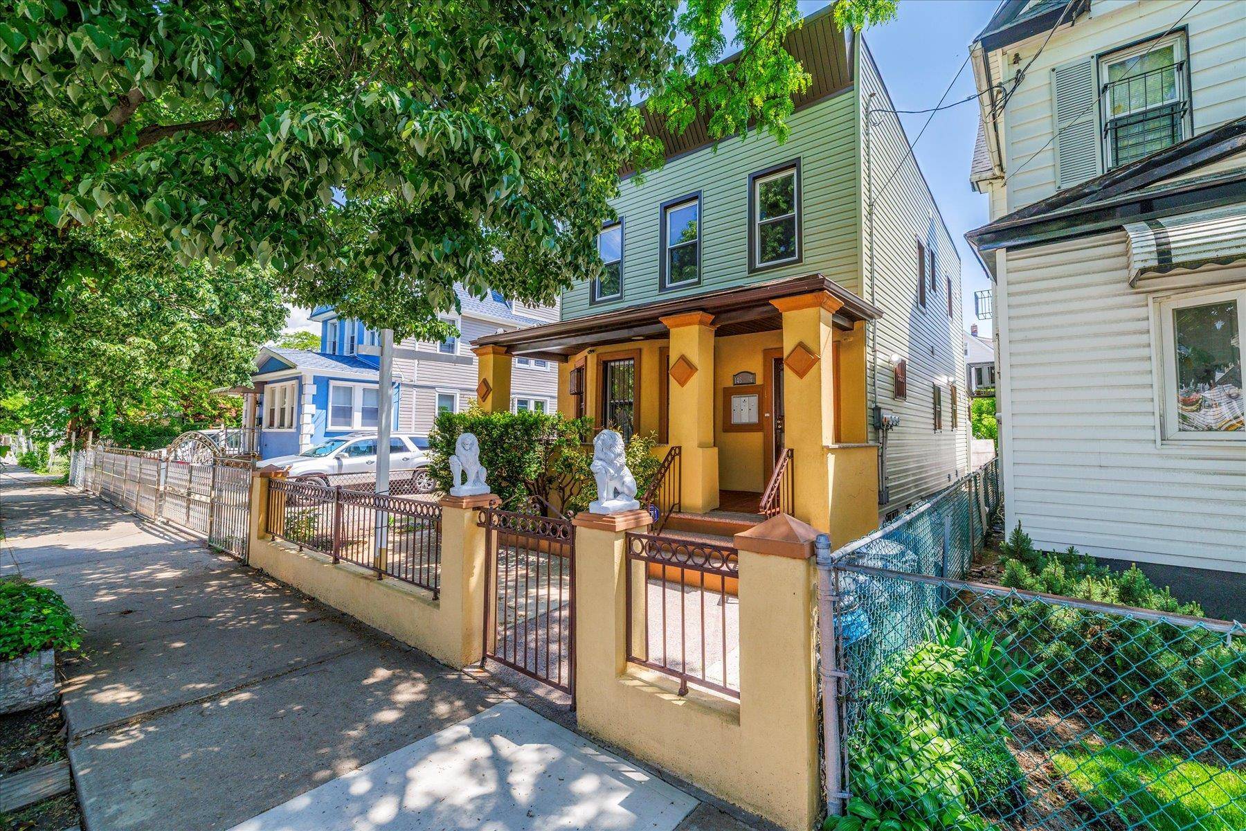 Welcome to this stunning, fully renovated two family home !