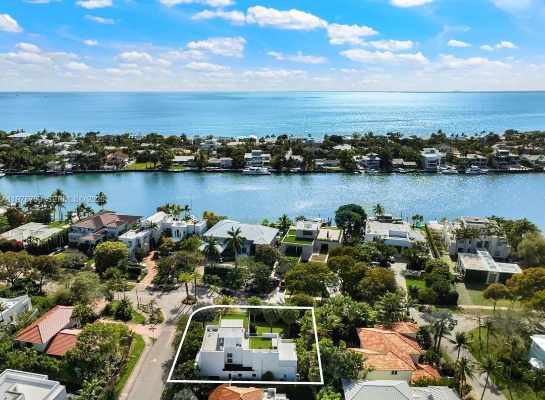 Refined 3 story modern contemporary residence on an oversized, beautifully landscaped corner lot along Key Biscayne s prestigious Harbor Drive, just 15 minutes from the Brickell Financial District, and featuring ...