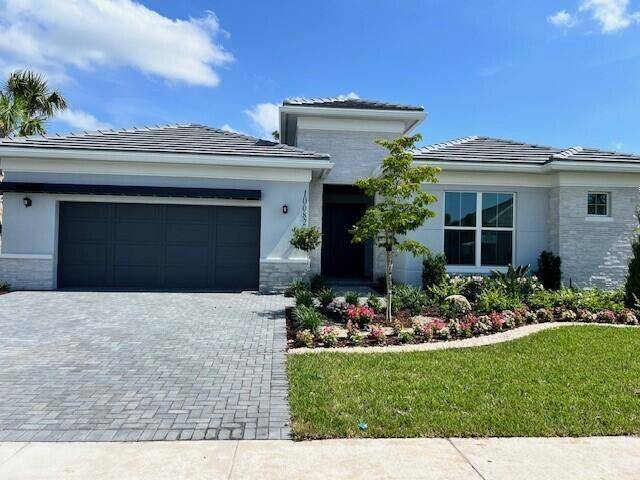 Welcome to this stunning home featuring a grand foyer with soaring 12' ceilings and an open concept layout.