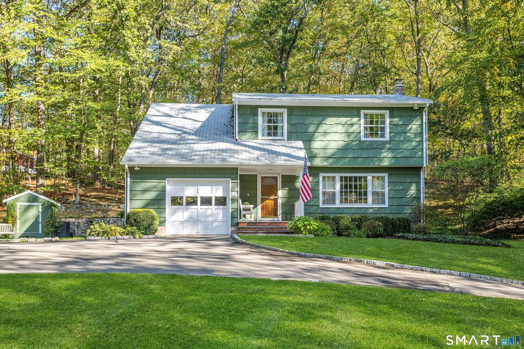 Classic four bedroom Colonial set on a private 1.