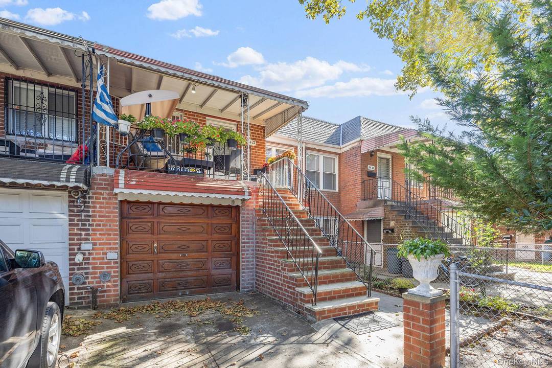 Welcome to this charming two family home located on a serene, tree lined street in the heart of East Elmhurst.