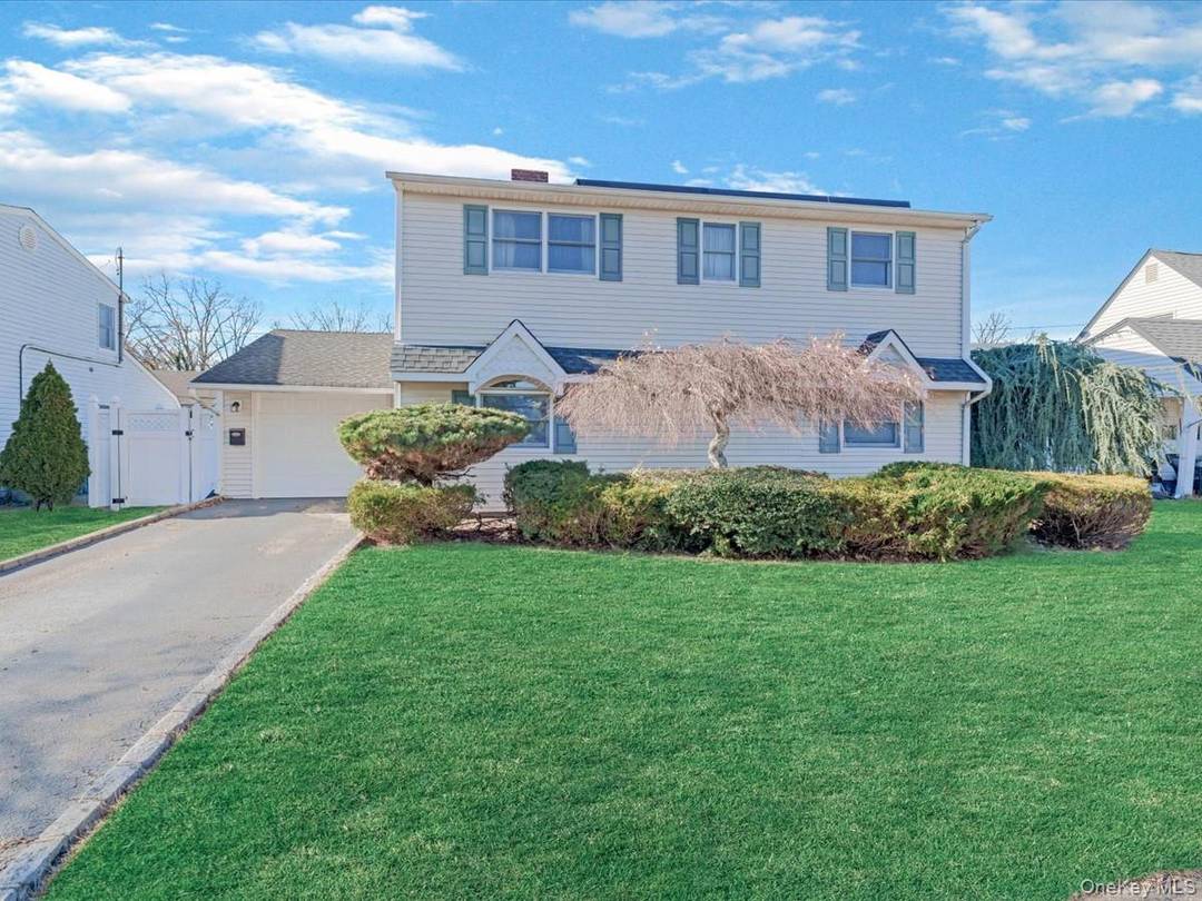 Welcome to 12 Cable Lane, a well maintained 5 bedroom, 2 bath home offering a flexible layout and bright, comfortable living spaces.