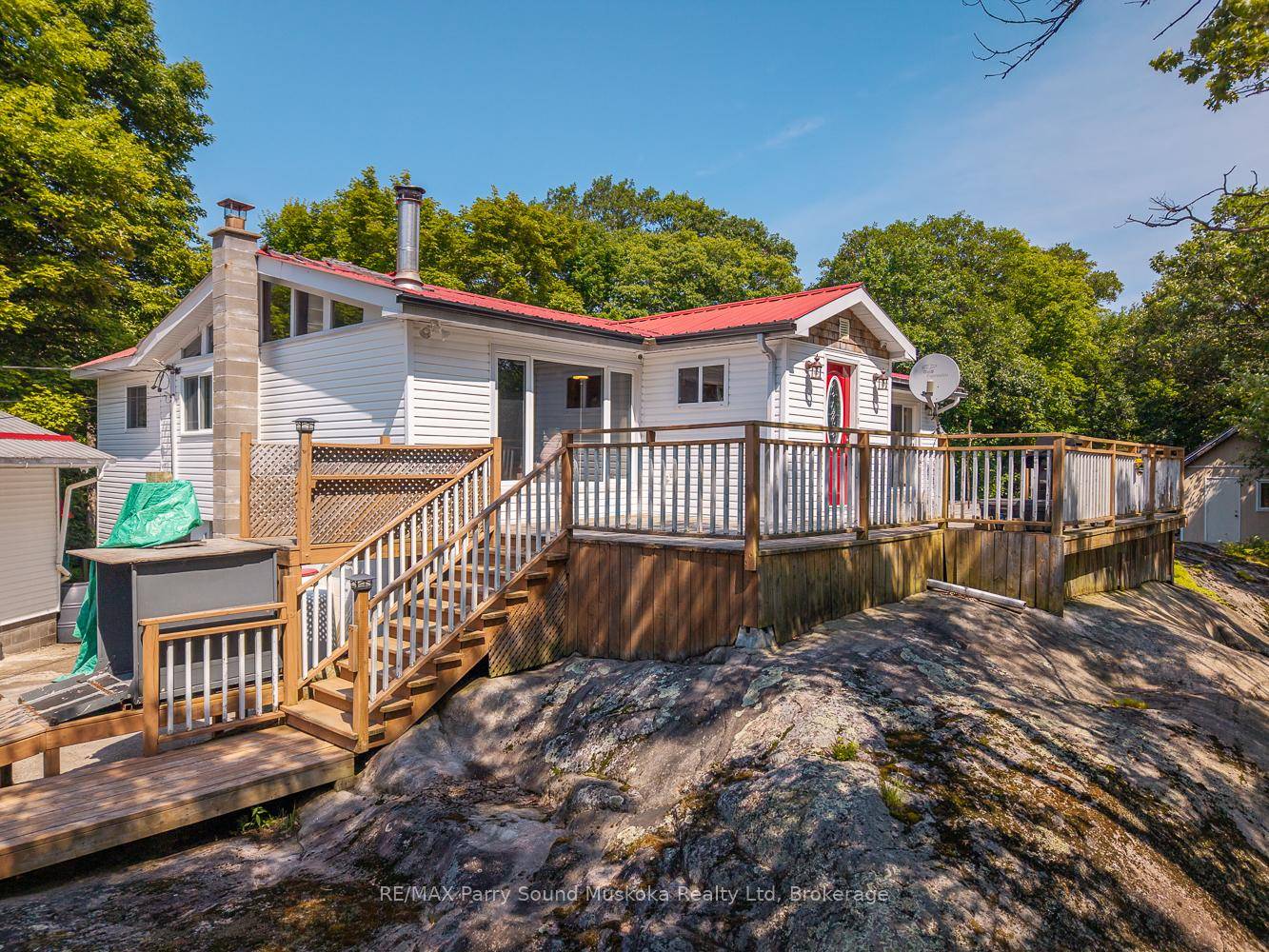 Set on 1. 4 acres in the Long Lake subdivision, this two bedroom home features a spacious floor plan with pine lined walls, cathedral ceilings, and hardwood floors throughout.