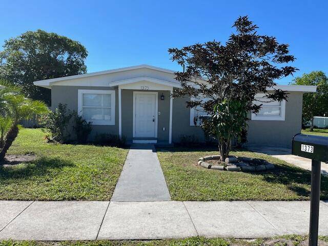 New Roof Coming Soon ! Welcome home to this charming 3 bedroom, 1 bath single family residence with no HOA in Riviera Beach.