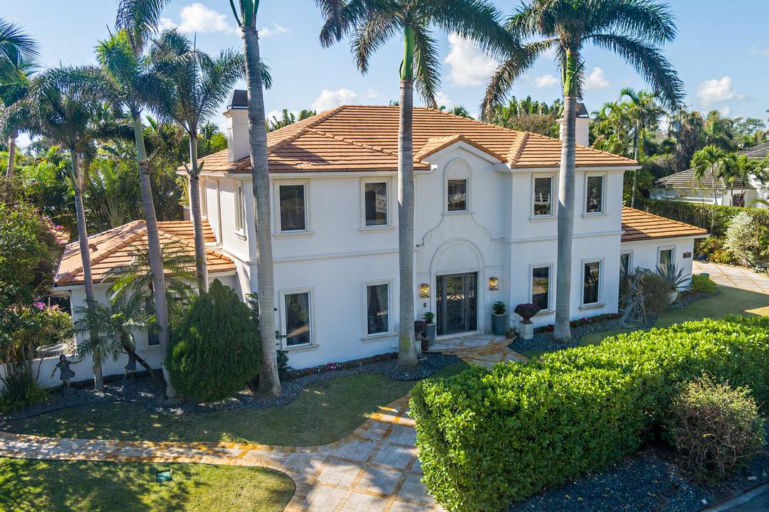 Set on a 16, 775 sf, high elevation lot, this estate showcases timeless architecture amp ; refined detailing, impact glass, whole house generator.