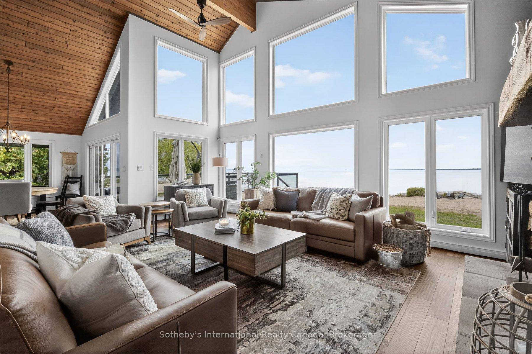 From the first light of dawn painting the bay in soft pinks to fiery sunsets stretching across the horizon, 1773 Champlain Rd offers a front row seat to the exquisite ...