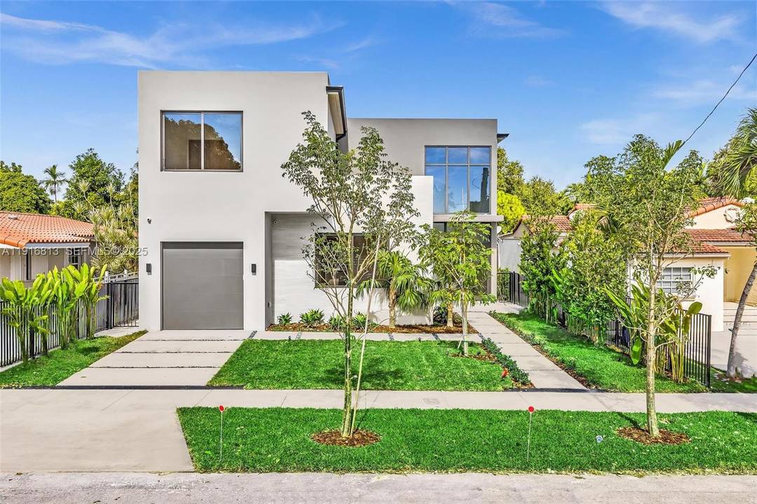 Exclusive New Construction Two story single family home showcasing refined modern living in the heart of Miami.