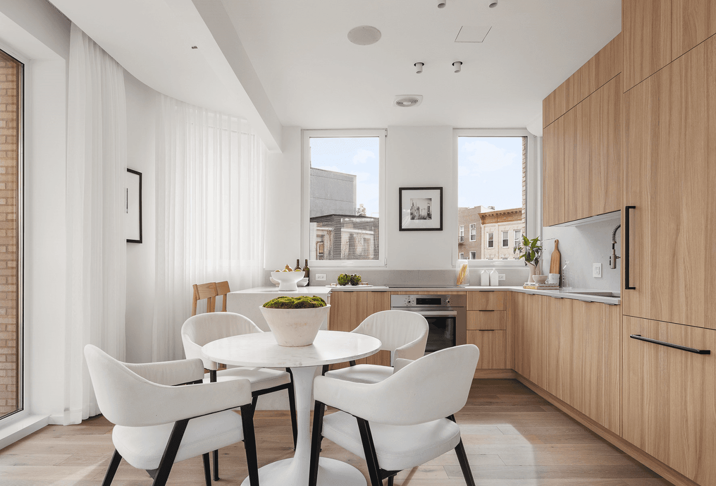 Welcome to this exquisite full floor condo with 3 bedrooms, 2 bathrooms, and a private terrace at The Woodpoint in Williamsburg.