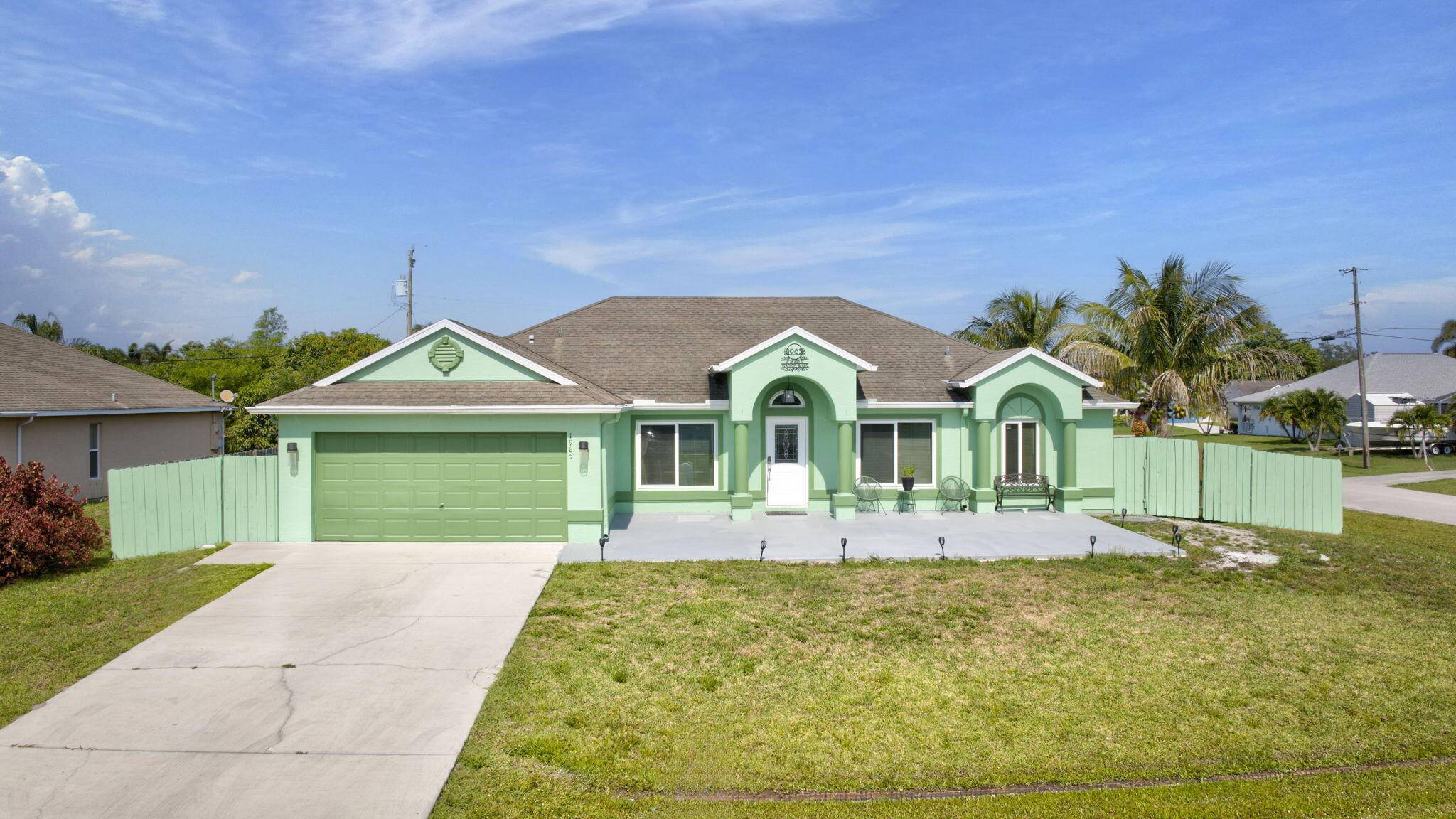 Spacious 4 bedroom, 2 bath, 2 car garage home on a large fenced in corner lot in Port St.