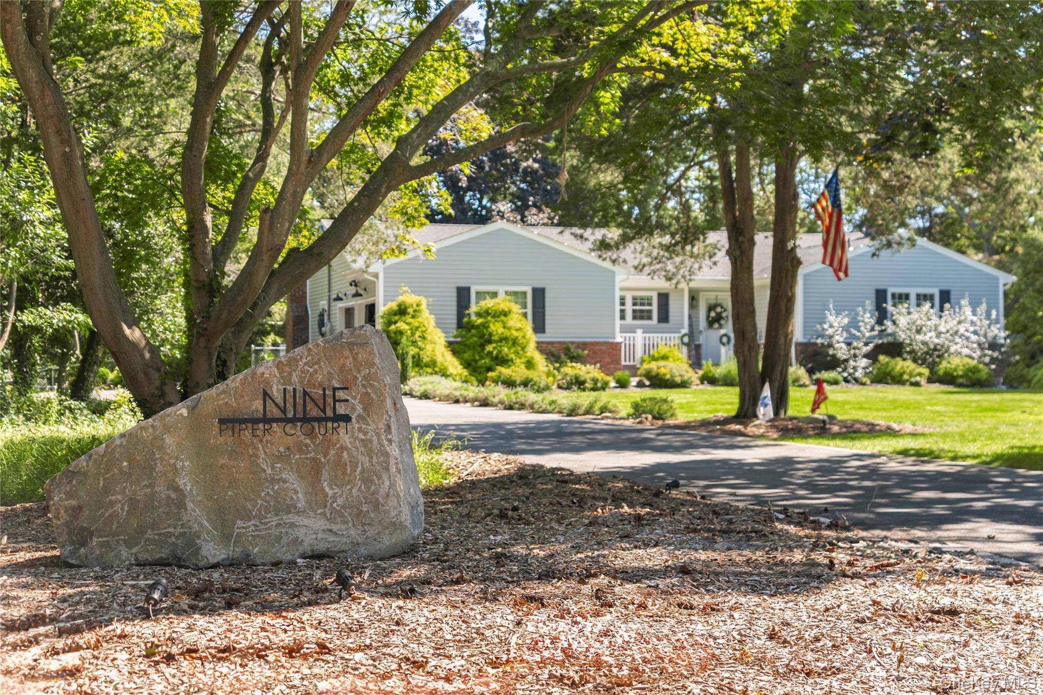 Set on a private cul de sac, this updated ranch offers the perfect blend of comfort, convenience, and lifestyle on a full acre of property.
