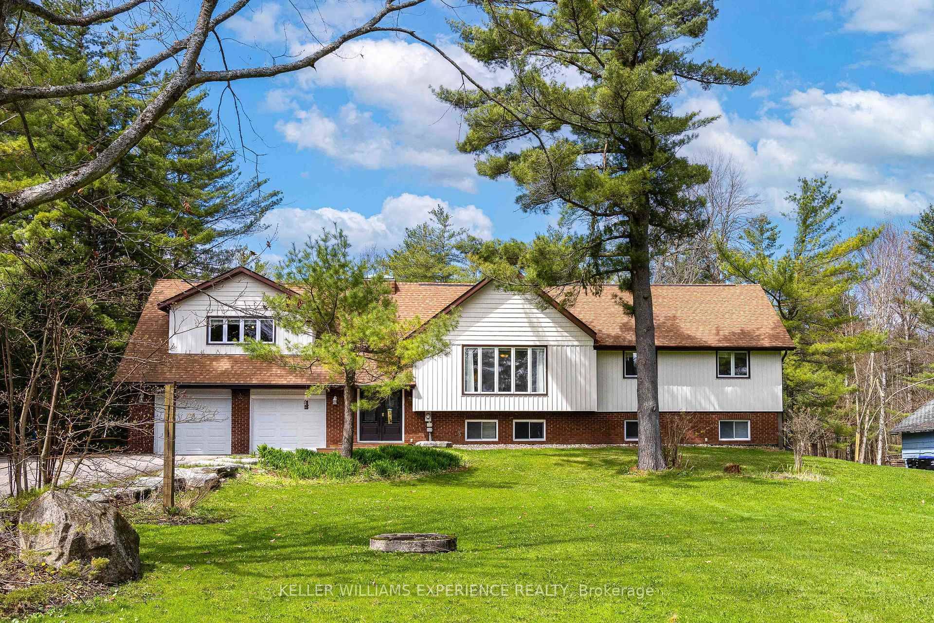 Welcome to this beautiful detached home set on approximately 1.