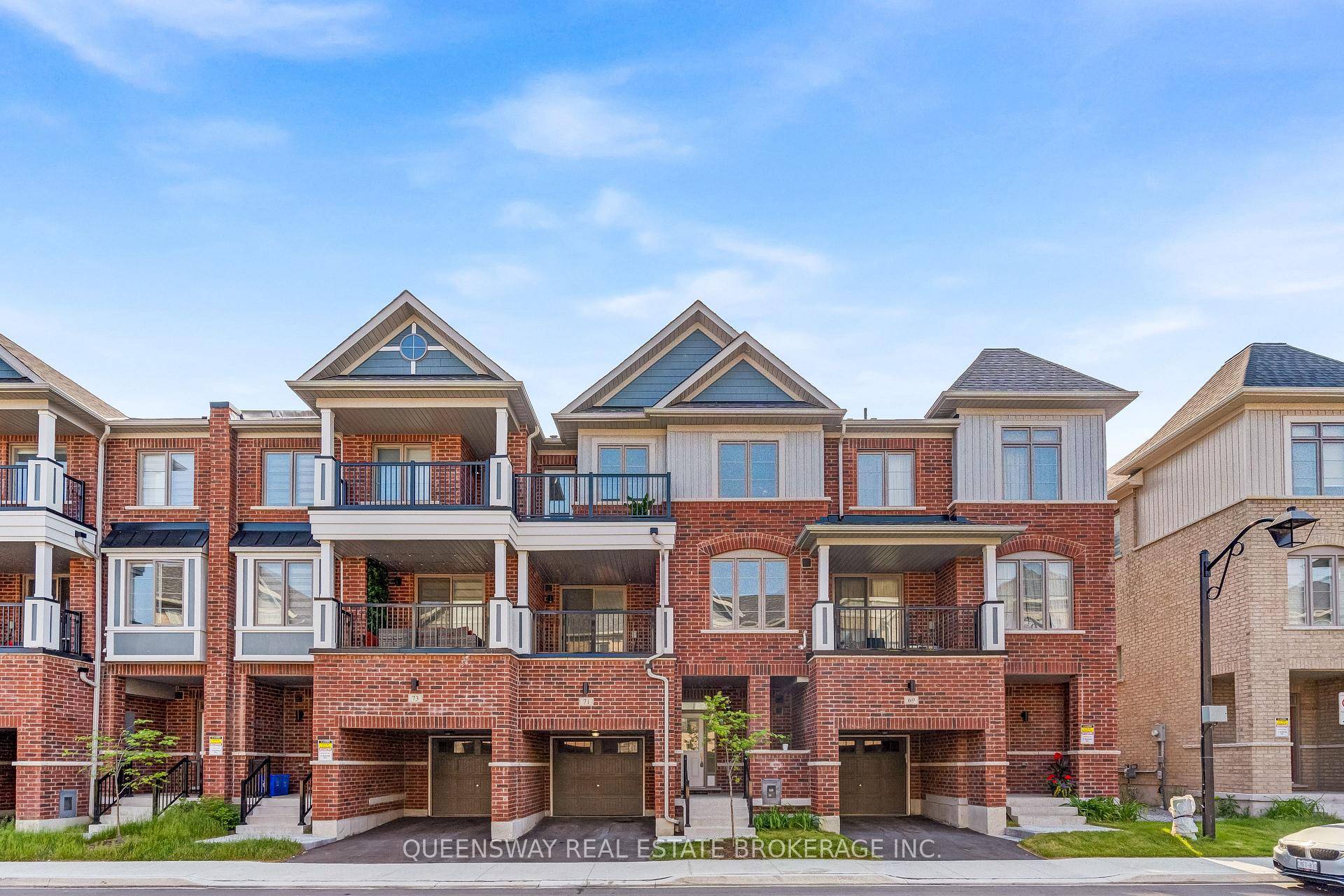 Beautifully Upgraded 3 Storey Townhome with Two Balconies in the Sought After Port Whitby Community !