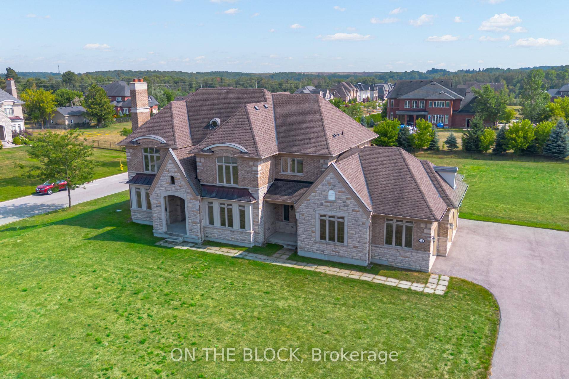 Welcome to 24 Whitewood Road, a masterfully designed luxury residence by award winning Geranium Homes situated in the heart of Ballantrae, one of Stouffville's most coveted enclaves.