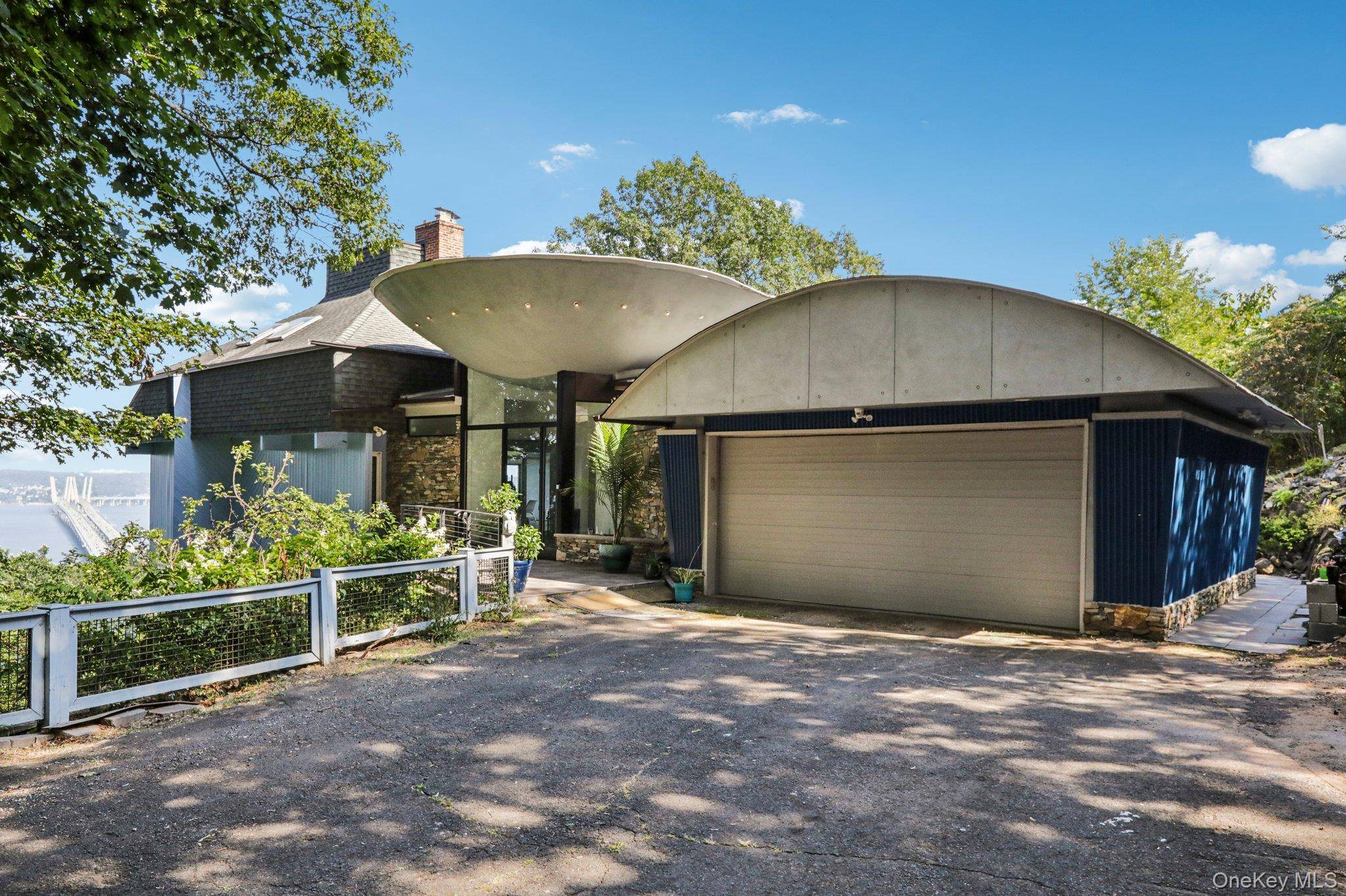 This Amazing Contemporary Home in one of the most sought after Locations along the Hudson River, has stunning River, Mountain, and Bridge Views !