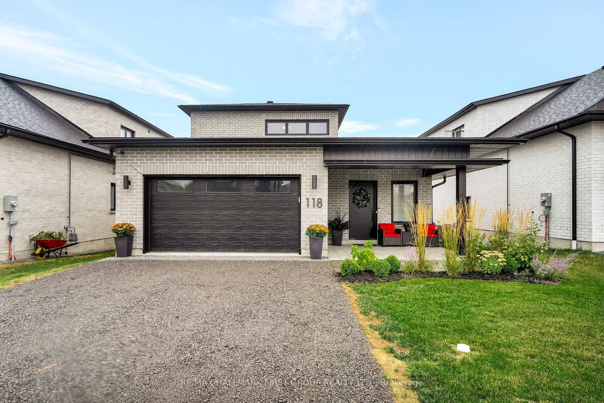 Better than brand new, this 1841sqft bungaloft built by Hunt Custom Homes offers slab on grade living backing onto a premium pond lot !