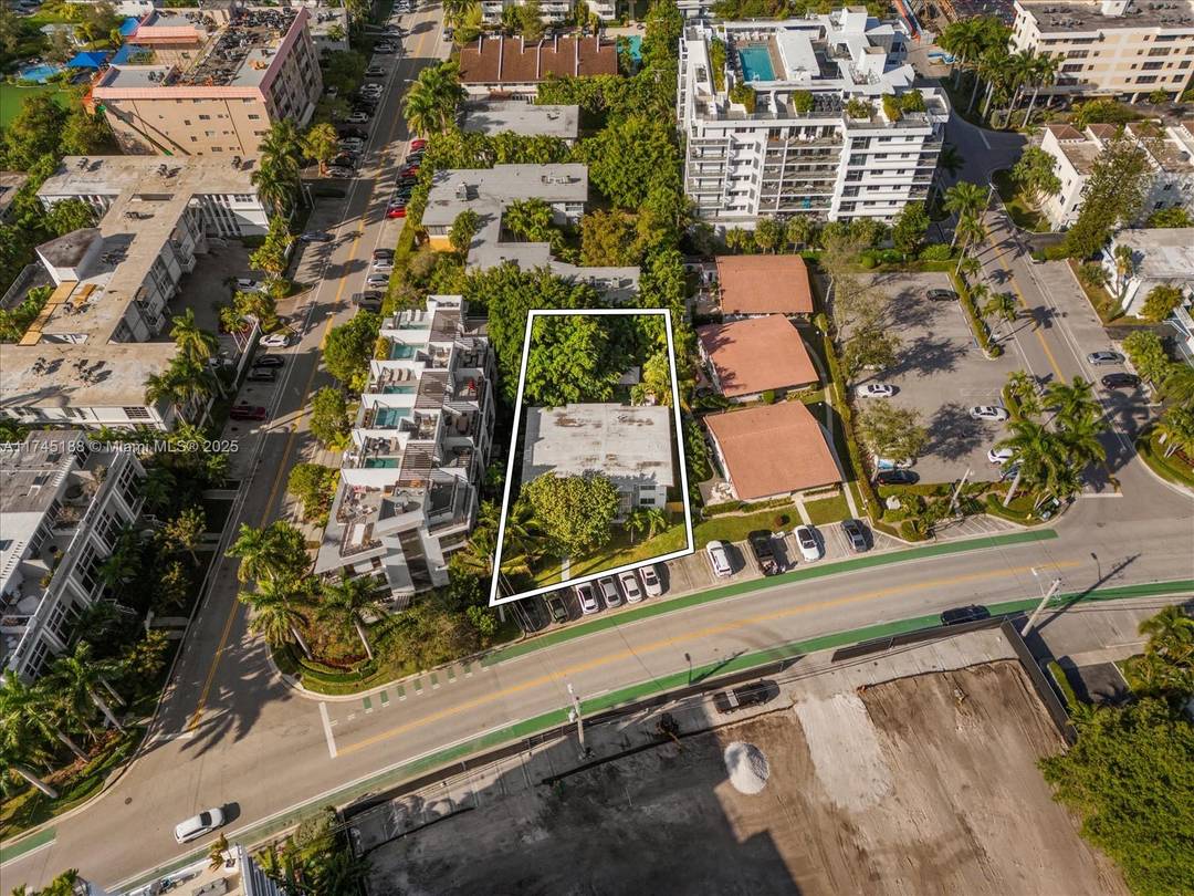 Income producing 4 unit STR multifamily with prime redevelopment potential in Bay Harbor Islands, directly across from the prestigious LA MARE project.