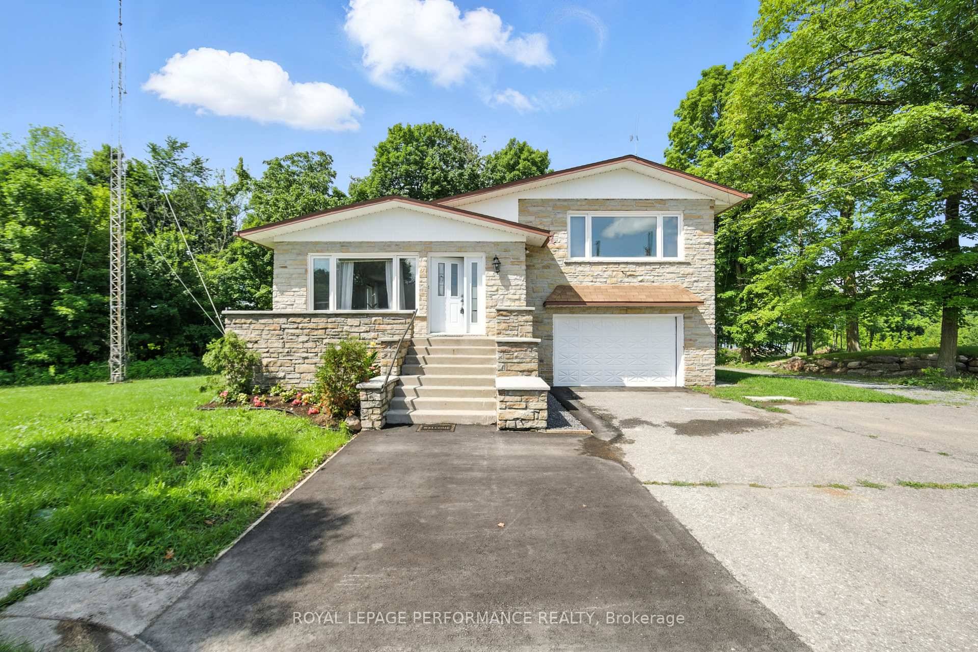 2505 Front Road, Chute a Blondeau, Ontario Waterfront Retreat with Inground Pool, Detached Workshop and Boathouse Hangar.