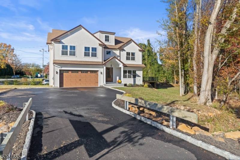 Step into timeless luxury at 1 Willow Place, a stunning new construction offering four finished levels of refined living.