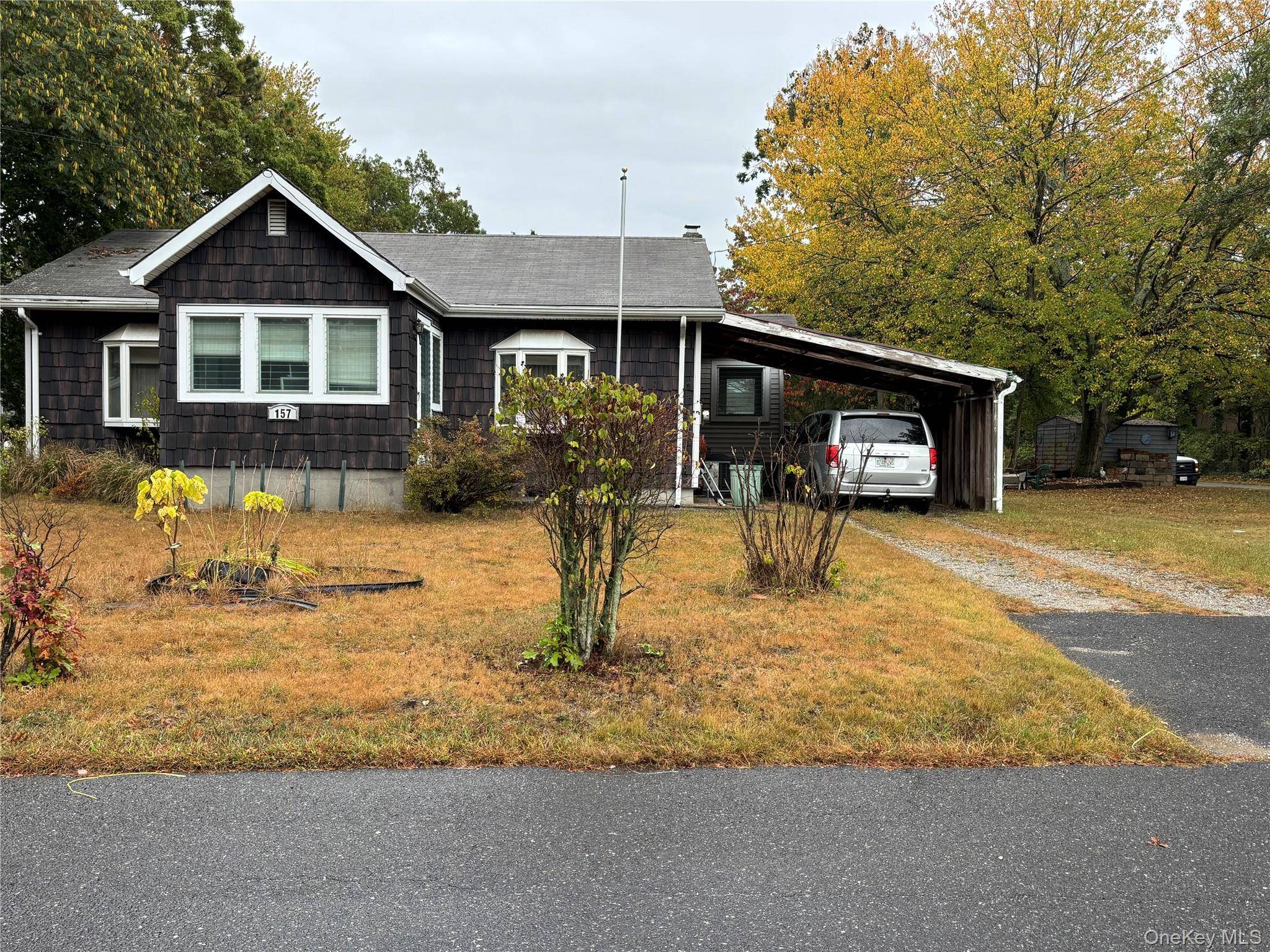 Charming two bedroom one bath ranch style home with enclosed porch and enclosed mudroom, Eat in kitchen with gas cooking, hardwood floors under the carpet, full basement with laundry, gas ...