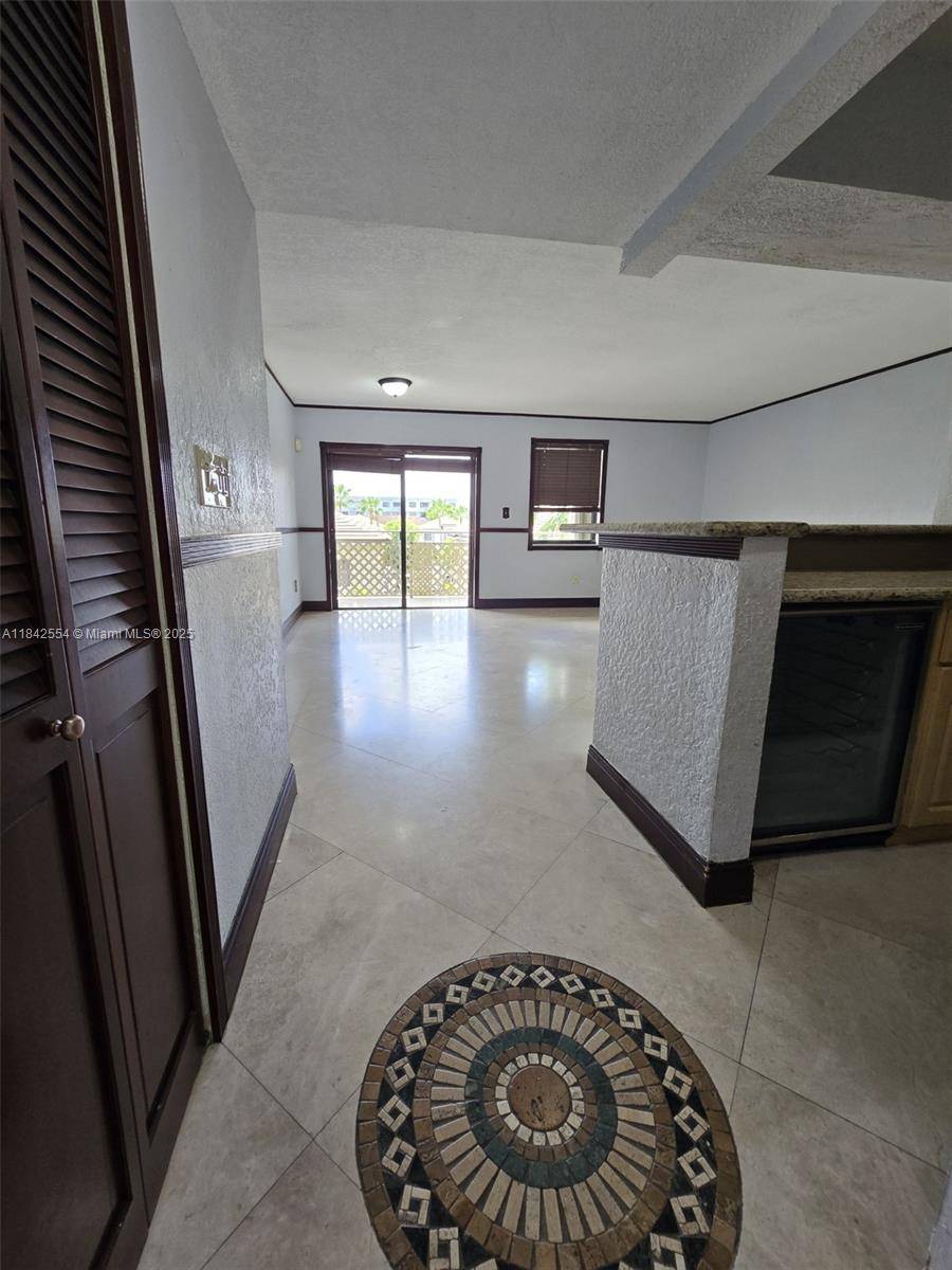 Beautiful 3 bedroom, 2 bath corner unit located at Visions at Fountainbleau, featuring elegant marble flooring throughout, real wood doors, a very spacious kitchen, a private balcony perfect for relaxing ...