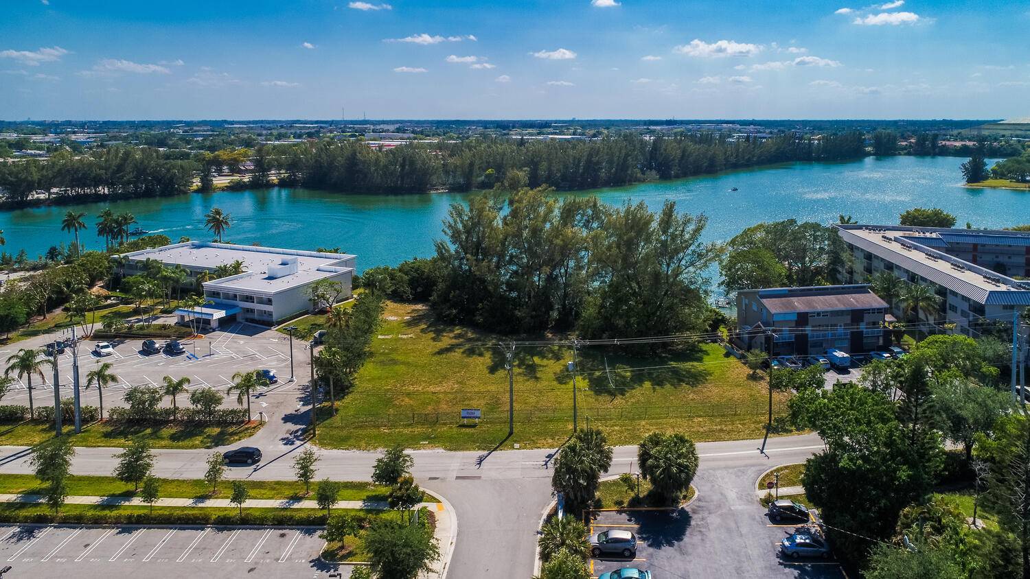 1. 3 ACRES OF VACANT FLAT LAND WITH 212 FEET OF WATERFRONT ON CRYSTAL LAKE SAILBOAT LAKE.