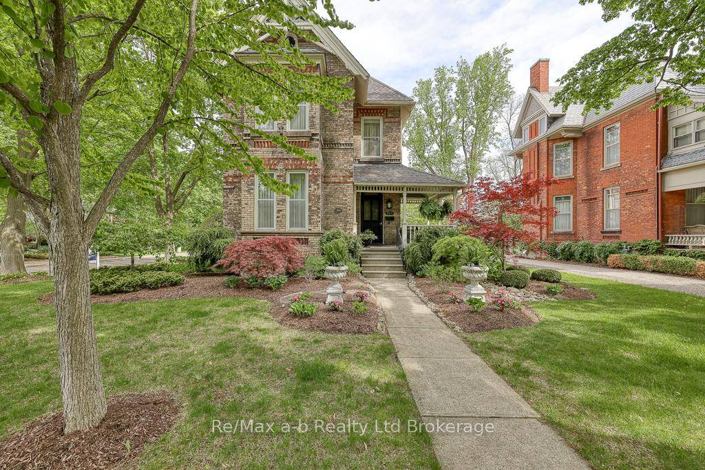 Step into the timeless elegance of this stunning 1885 Victorian Queen Anne home, where historic charm meets modern convenience.