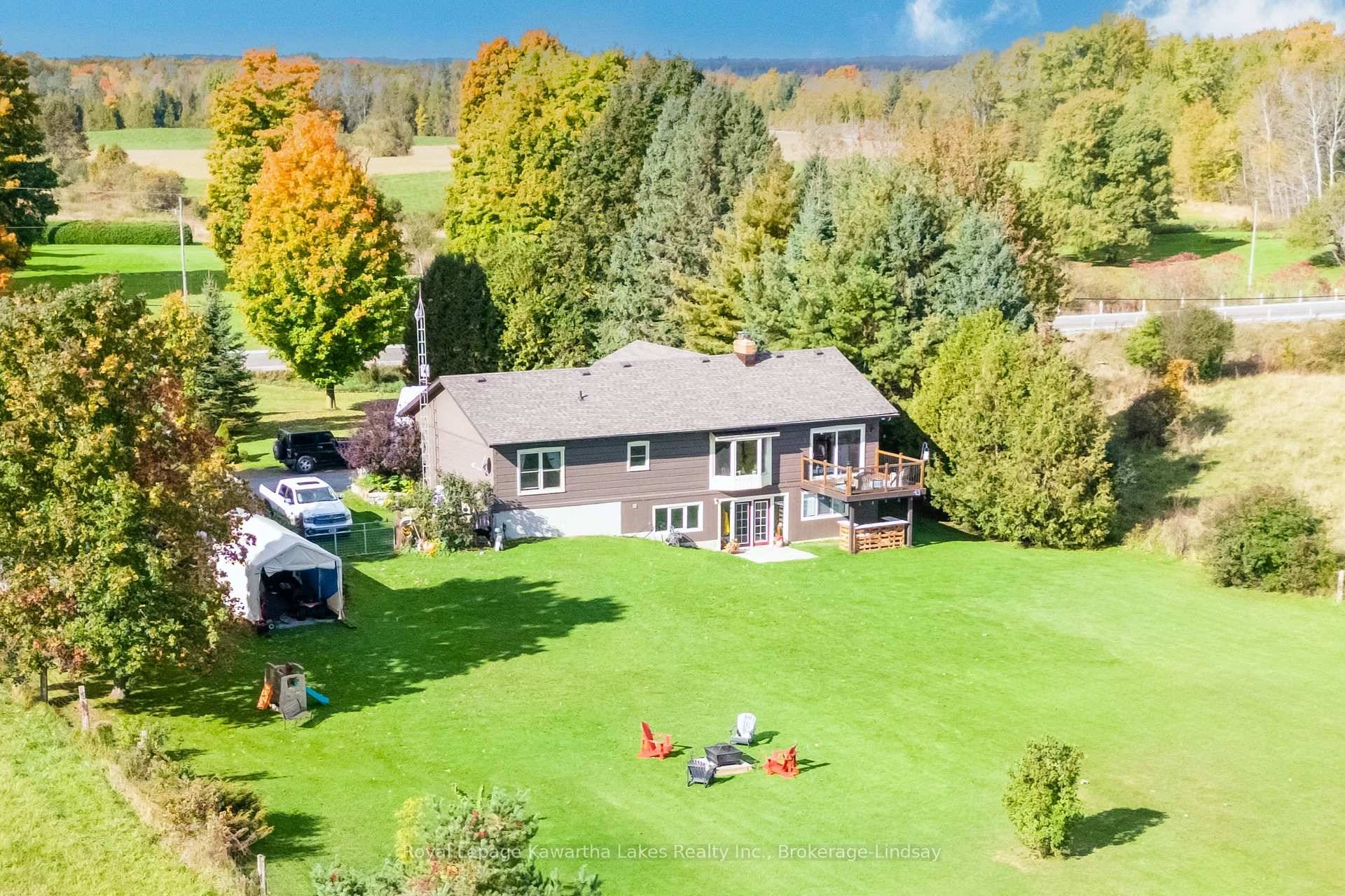 An impressive 1700 sqft countryside log home with a double attached garage on 1.
