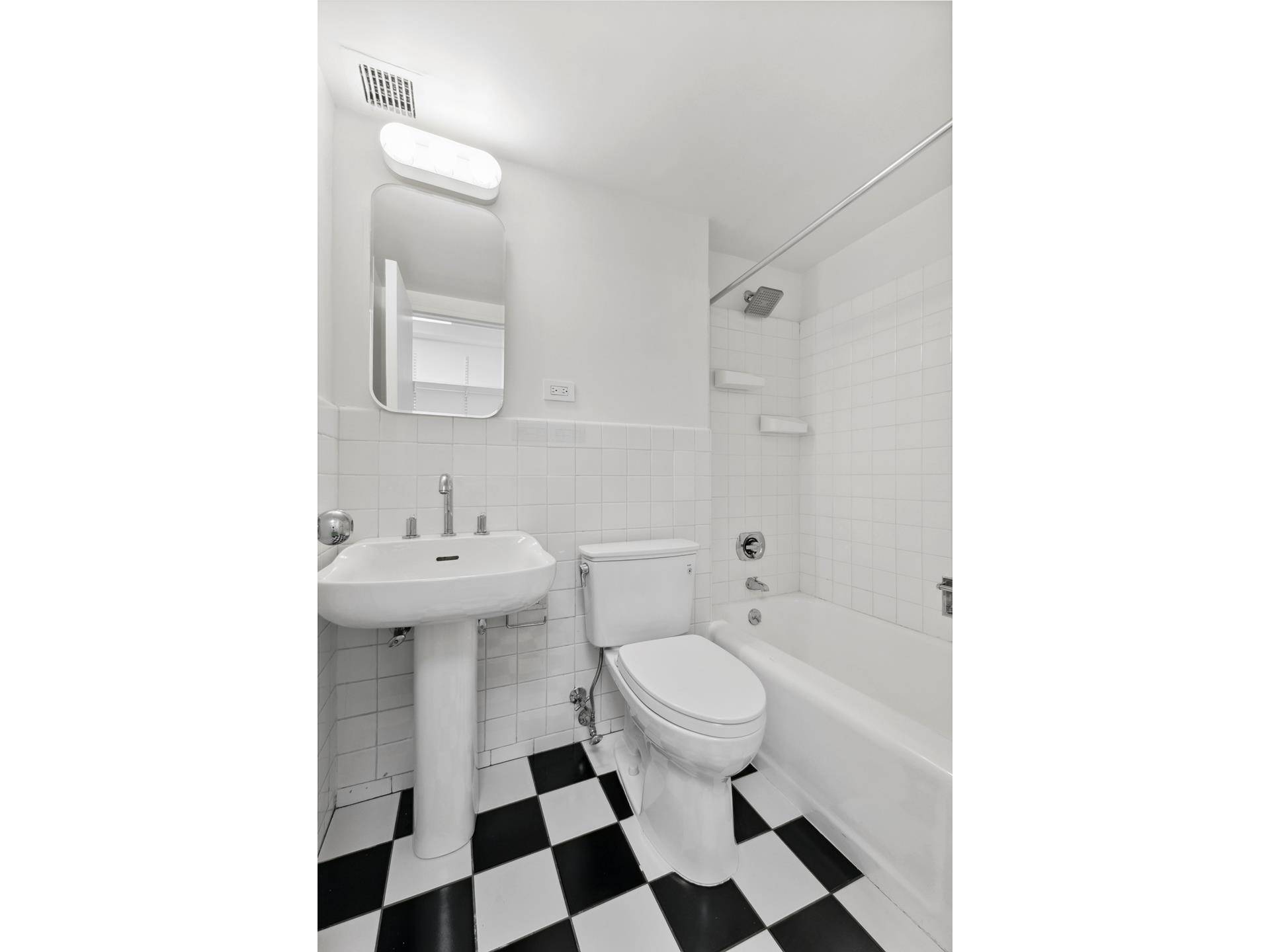Apartment 2E at 2 Fifth Avenue offers an unparalleled opportunity to own a designer crafted studio in one of Greenwich Village's most coveted addresses.