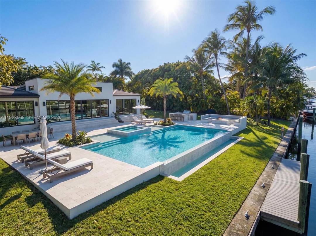 Recently fully renovated and reimagined with a complete modern transformation, this exceptional 3, 100 SF residence is positioned on an elevated 16, 800 SF double lot with 113 feet of ...