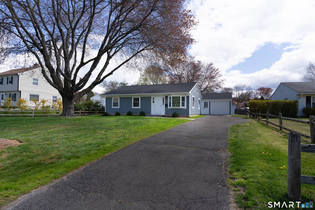 Like new construction, this home has been totally renovated in 2022 with a new roof, windows, siding, heat and A c system, electrical, LED lighting, flooring, kitchens, baths, laundry, paint ...