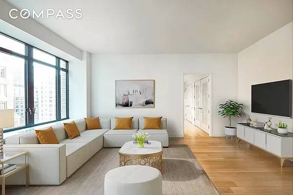 The residence spans 1, 700 square feet and includes three bedrooms and two and a half bathrooms.