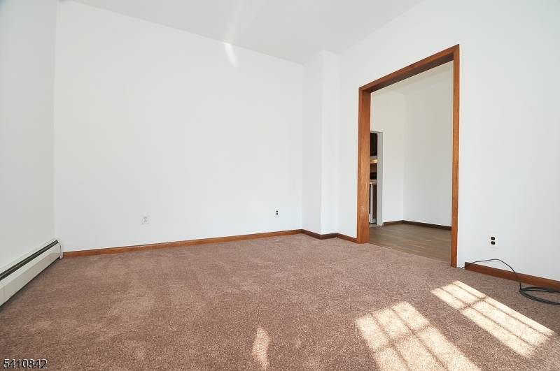 Spacious Multi Family home located on quiet no through traffic street with 2 large apartments.