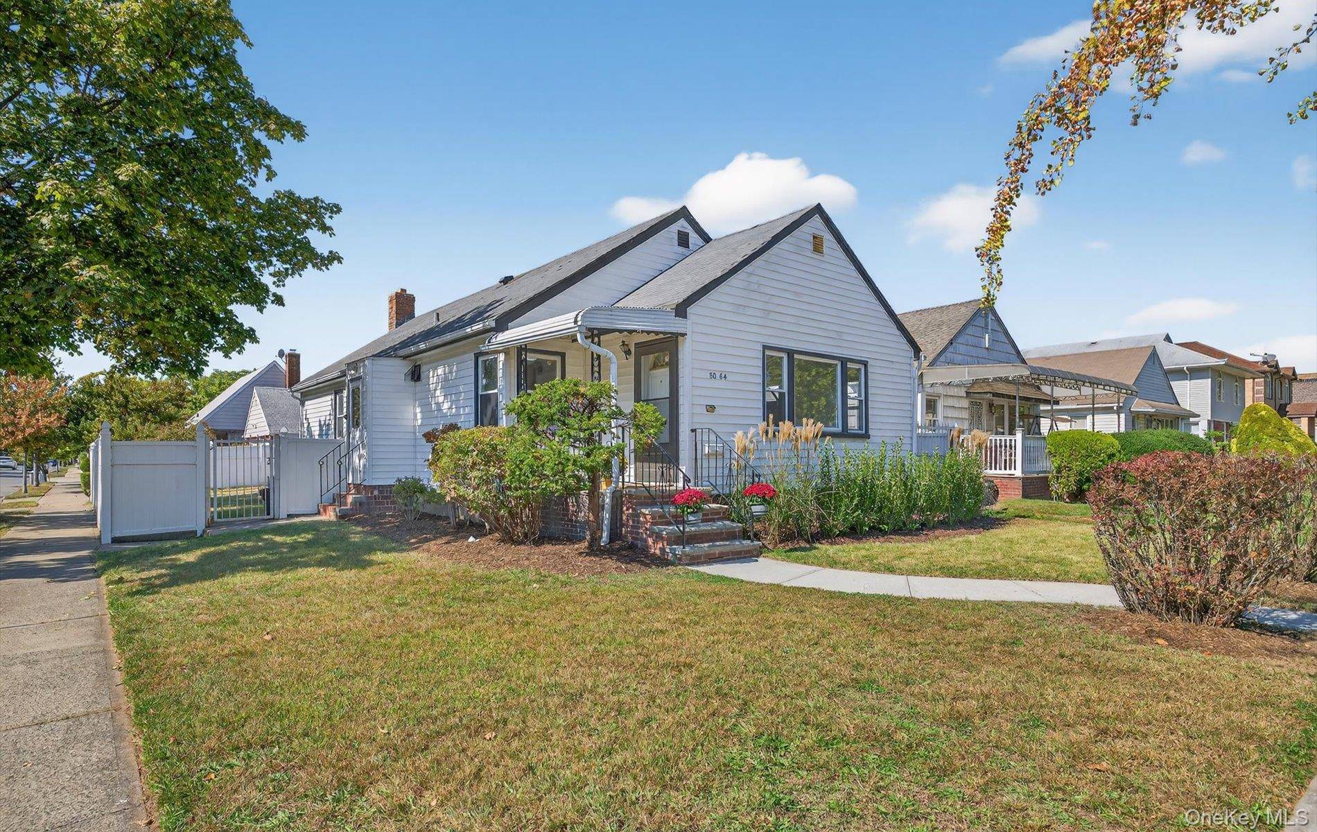 This charming ranch home features three bedrooms and a fully finished basement, offering ample living space.