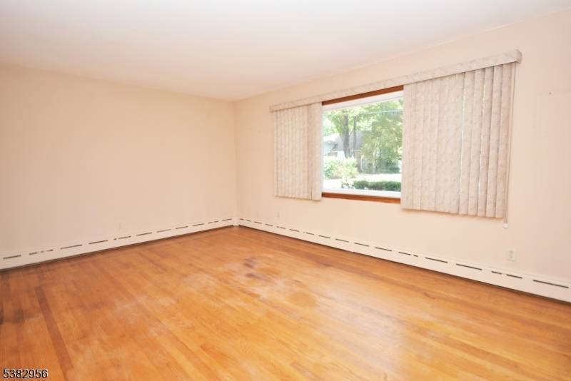 Opportunity awaits ! This light filled two family home with plenty of potential is located on a quiet, dead end street and will appeal to investors and homeowners.