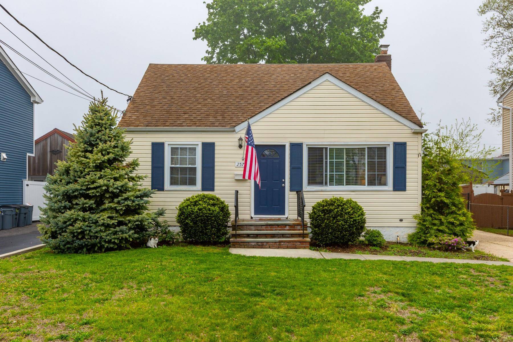 Charming expanded cape located in The Village of Lindenhurst.