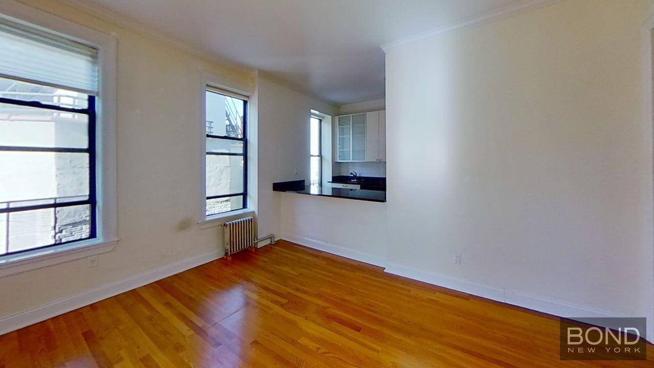 Stunning 2 bedrooms. Open large kitchen with marble counter top, white cabinets and Stainless Steel appliances.