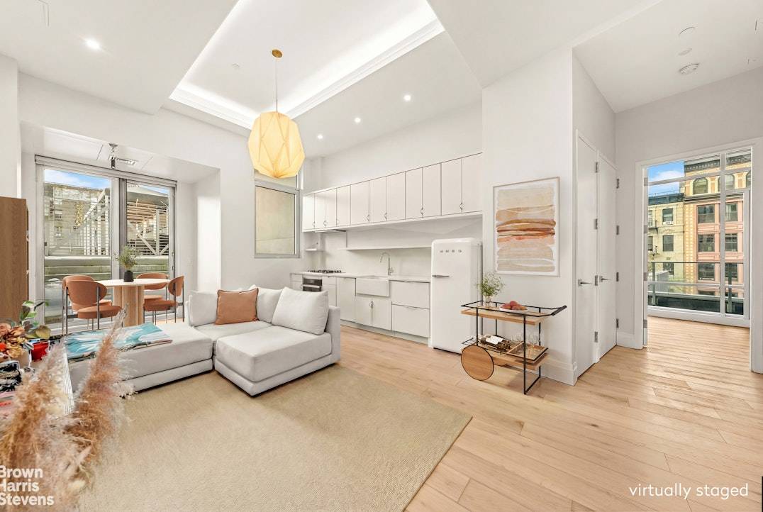 A striking, loft like one bedroom residence in a boutique luxury condominium with a pool, perfectly positioned at the crossroads of NoHo, the East Village, and Nolita.