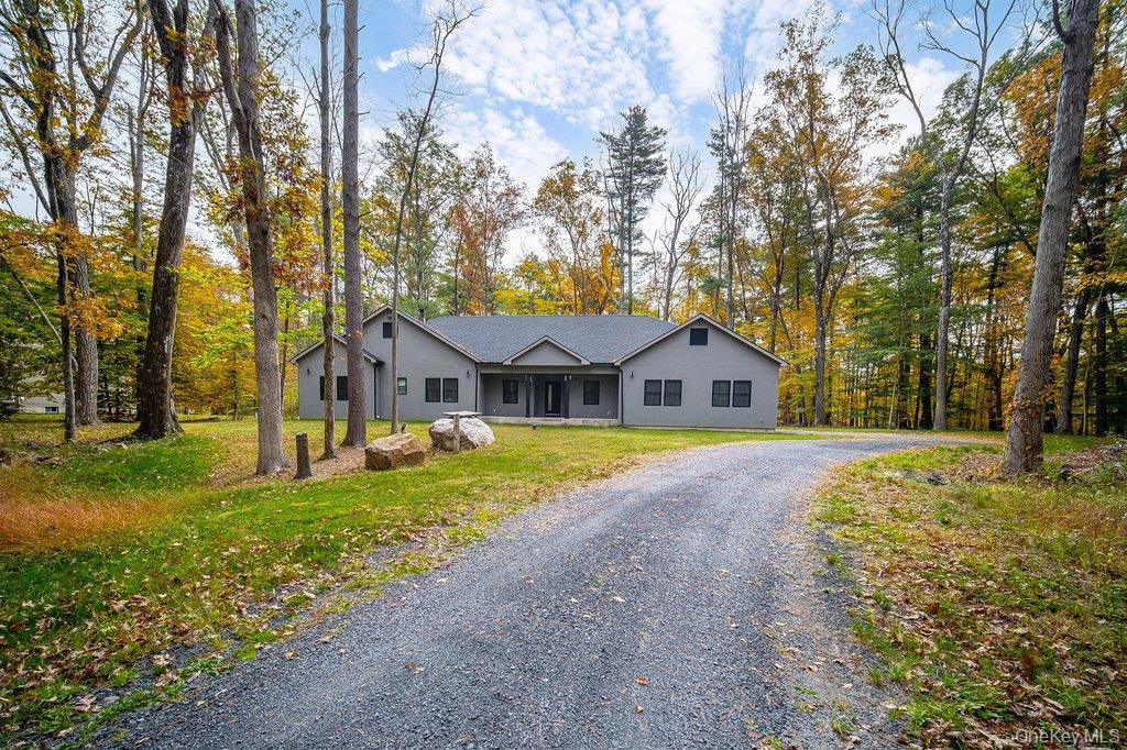 Welcome to this nearly new four bedroom, three bath ranch style home, nestled on a picturesque two acre, tree lined lot that offers both privacy and natural beauty.
