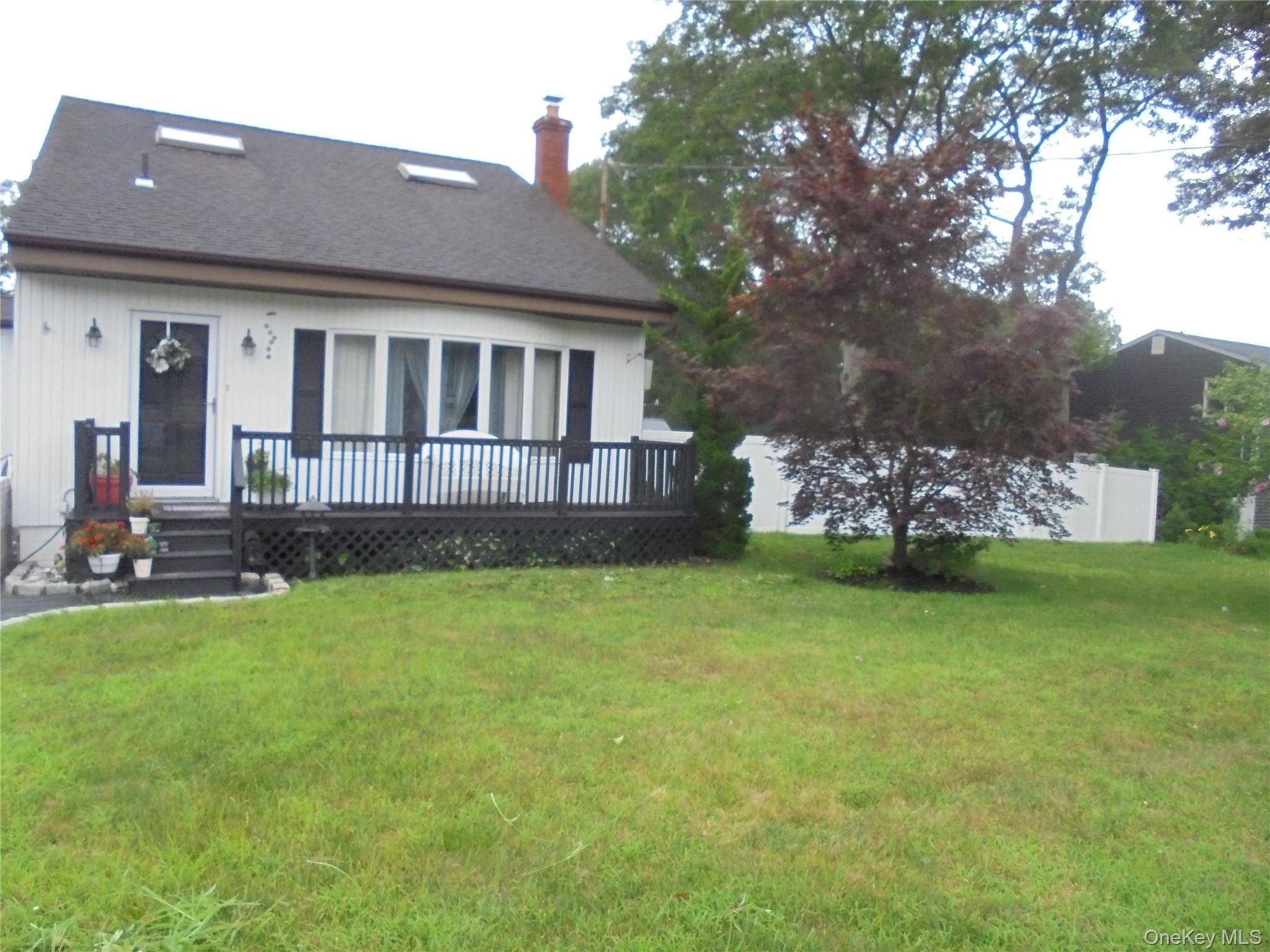 A cozy, up to date Cape home, plenty of room for extended family.