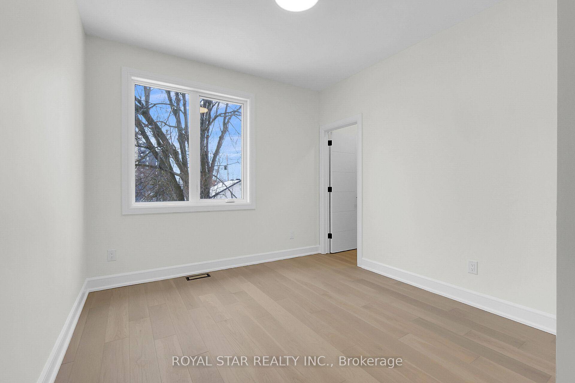 This contemporary end unit townhome is 2211 Sq Ft.