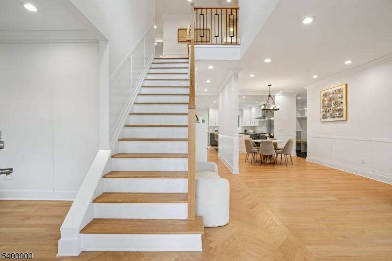 Experience the pinnacle of luxury living in this magnificent newer construction Colonial, offering over 4, 700 sq ft of exquisite craftsmanship on 0.