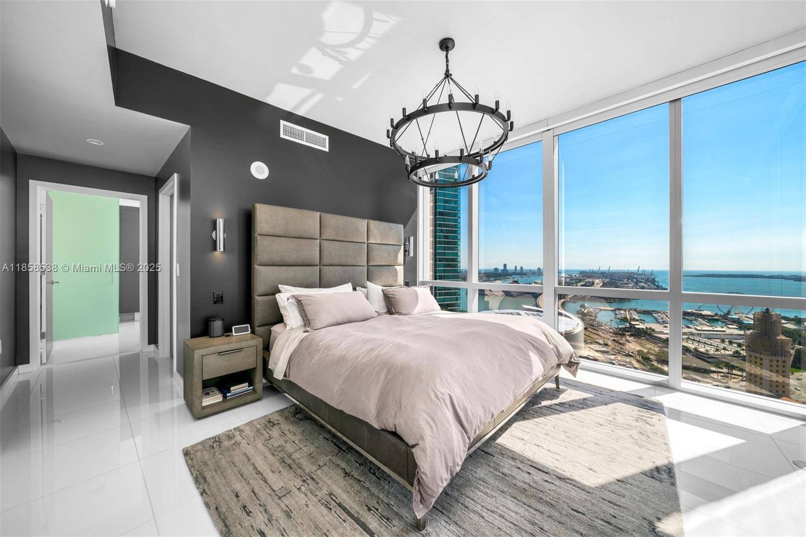 Immaculately designed 3 Bed Den 4 Bath condo at the luxurious Paramount Miami Worldcenter featuring 2, 188 int sq ft, 202 sq ft of terrace, private elevator foyer, laundry room ...