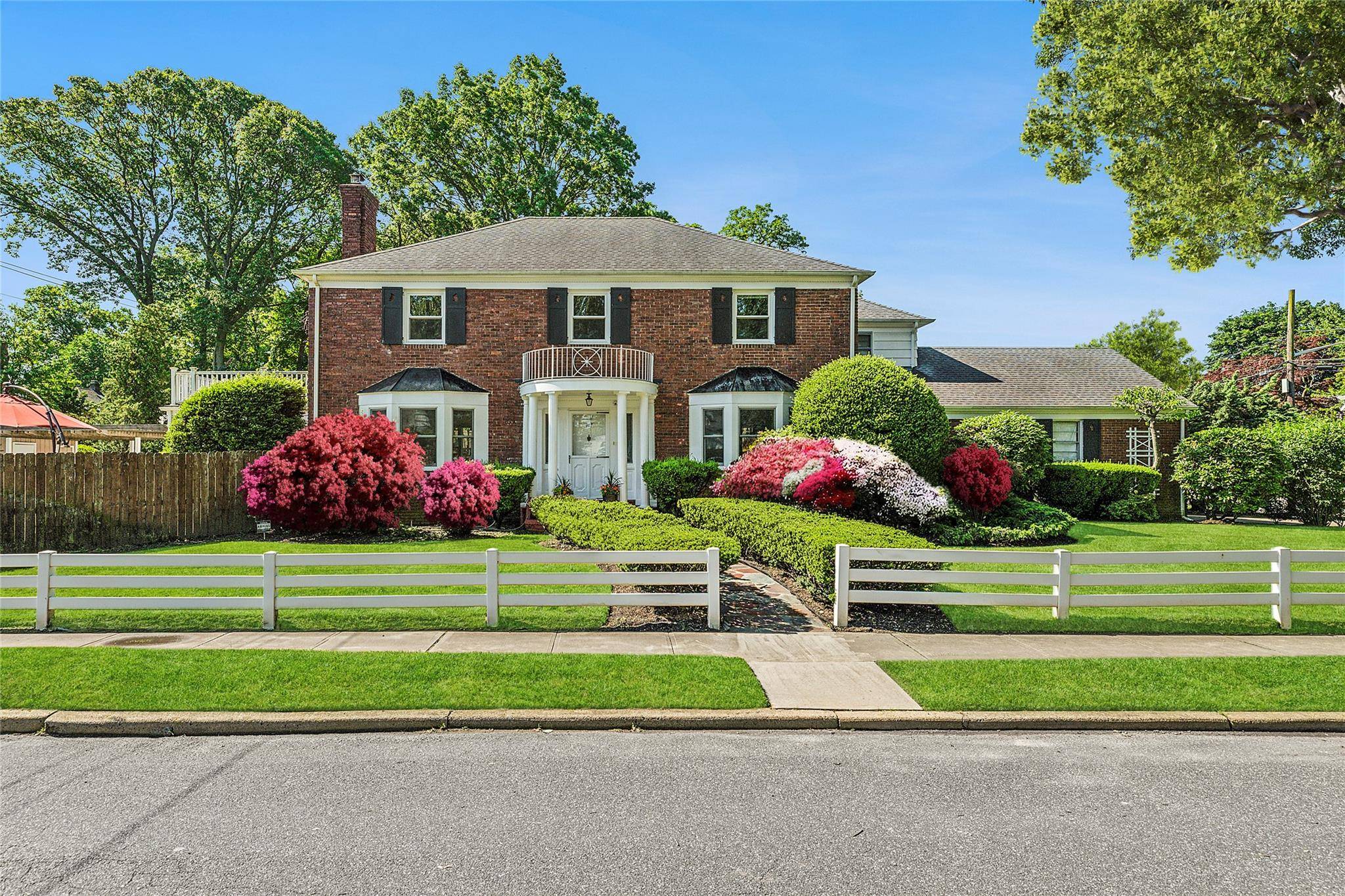 Nestled in the prestigious Stearns Park section of Freeport, within the Baldwin School District, discover this stately Center Hall Brick Colonial.