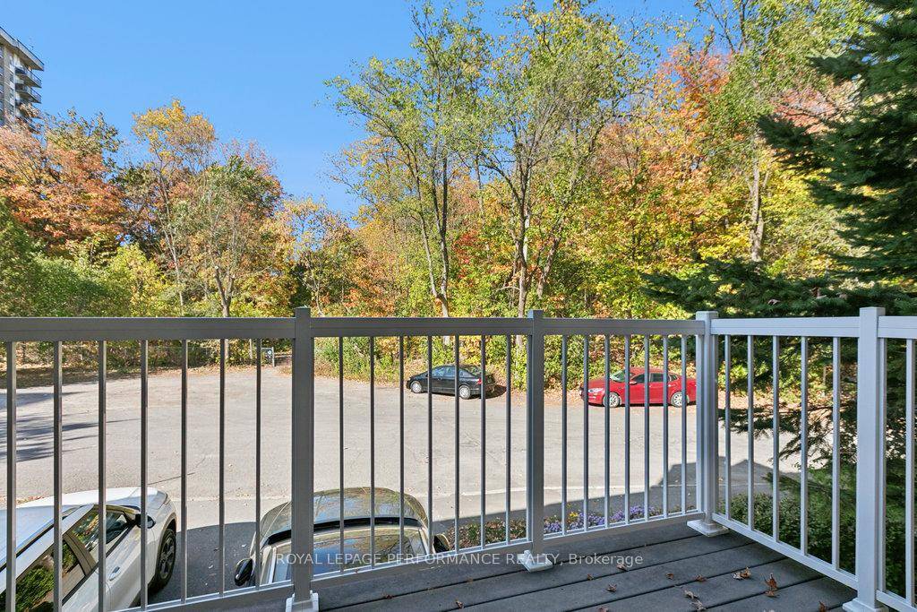 Rare Find End Unit Freehold Townhome Fronting on NCC Land !
