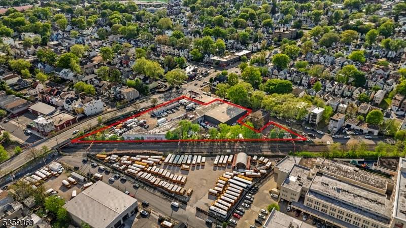 Unlock the potential of this centrally located 85, 000 sq ft lot that includes a 9, 000 sq ft warehouse, ideally suited for commercial use or future development.