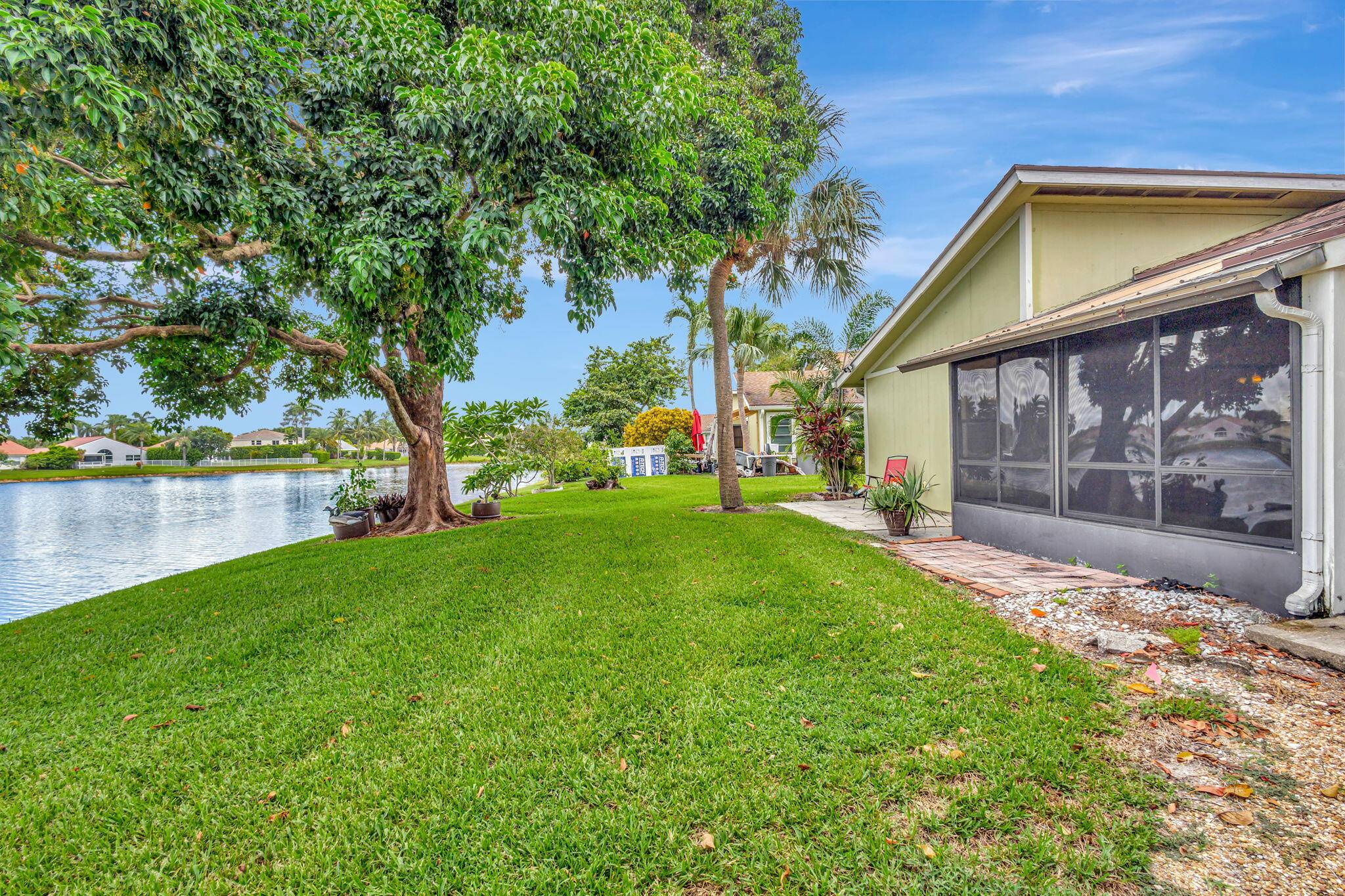 Welcome to this spectacular villa with breathtaking water views and plush greenery.