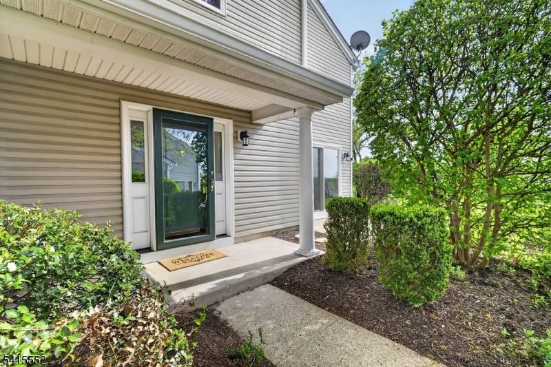 Your custom gourmet kitchen awaits in this end unit townhome in the Hills with a coveted 2 car garage 2nd floor loft !