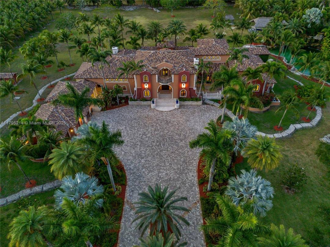 One of a kind 6BD 5BA 2HB Mediterranean Redland Estate on 10 pristine acres on Redland Country Club golf course.