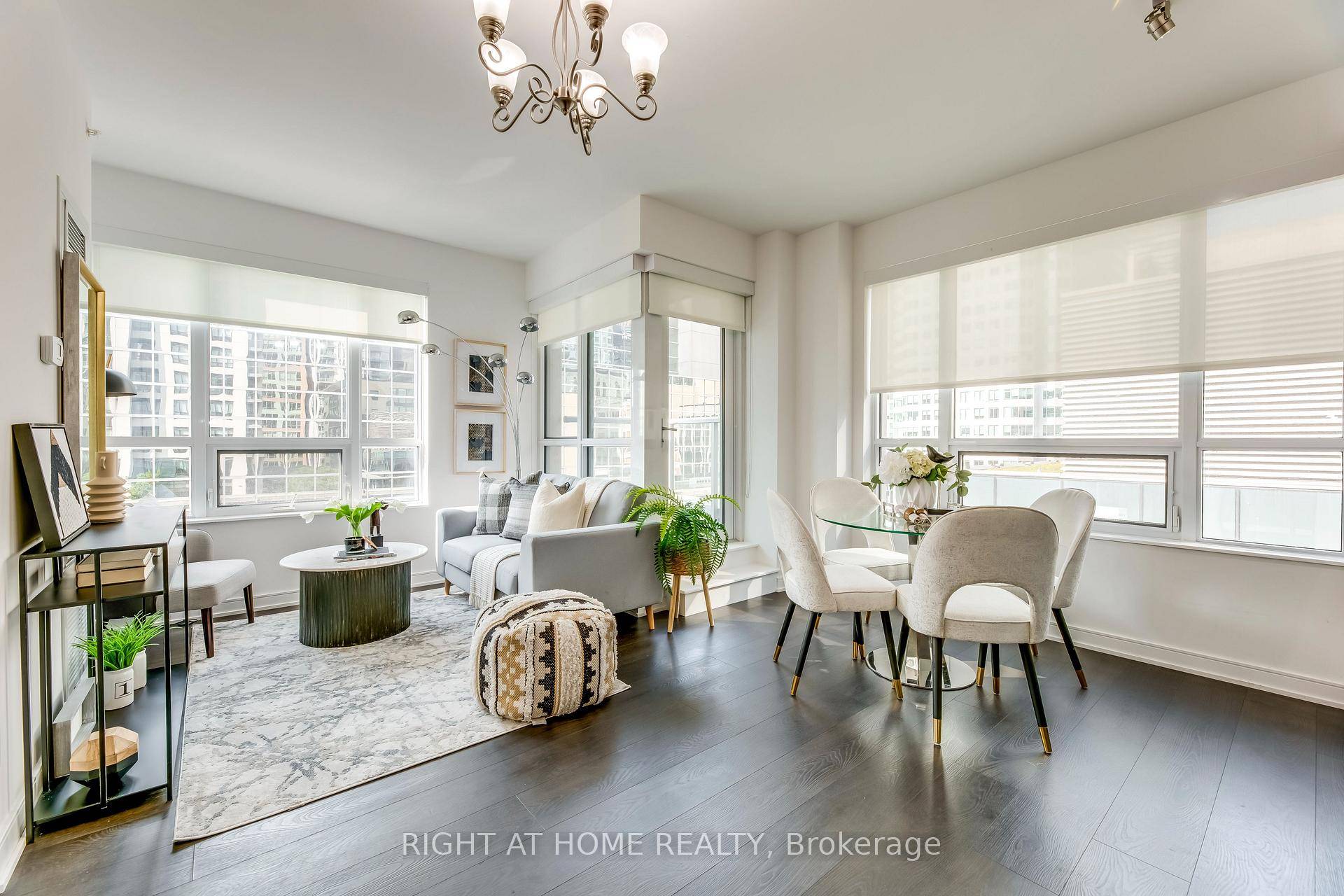 Exquisite Corner Suite with Southwestern View, featuring 2 Bedrooms with expansive windows and 2 full Baths at 88 Scott.