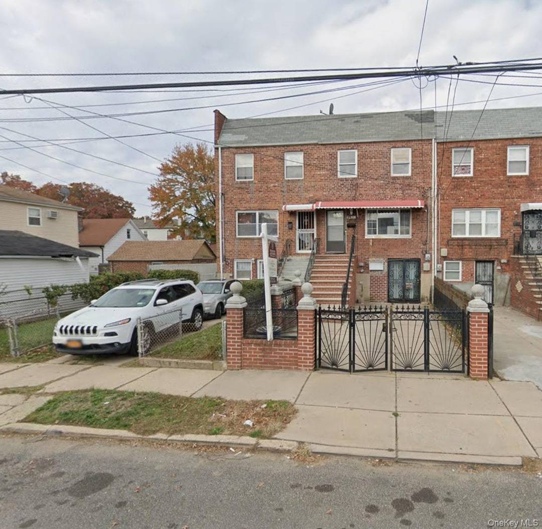 Welcome to 179 15 Eveleth Road a charming brick residence on a quiet, tree lined block in the heart of Springfield Gardens, Queens.